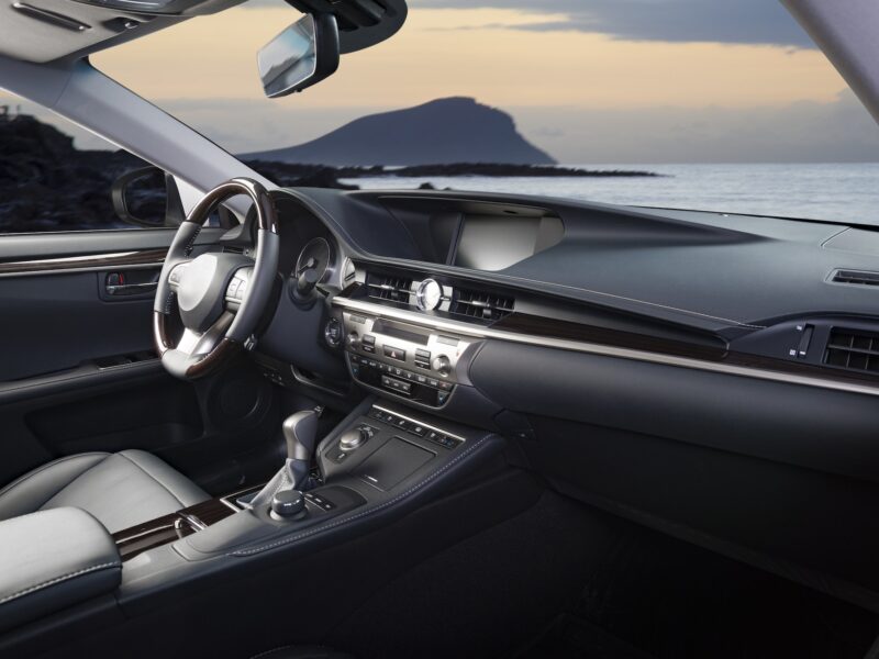 car-dashboard-modern-luxury-interior-steering-wheel-sun-rise-in-the-windows